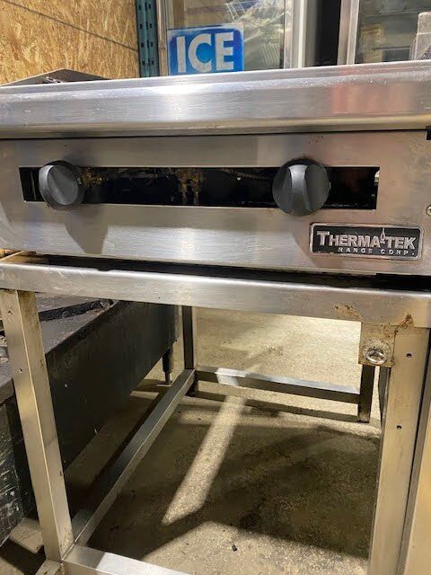 Therma Tek 24 Natural Gas Charbroiler on a work stand for sale Canada